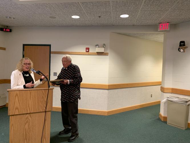 Mayor Charlene Klein presents John Swanson with a certificate of appreciation during the March 25 City Council meeting
