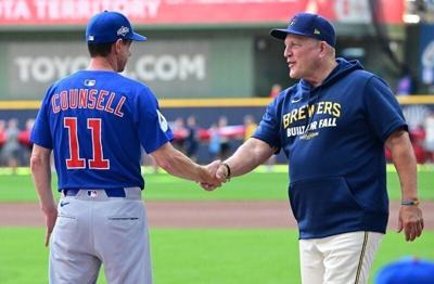 Oct 4, 2025; Milwaukee, Wisconsin, USA; Chicago Cubs manager Craig Counsell (11) shakes hands with Milwaukee Brewers manager Pat Murphy (49) before game one of the NLDS round for the 2025 MLB playoffs between the Chicago Cubs and Milwaukee Brewers at Am...