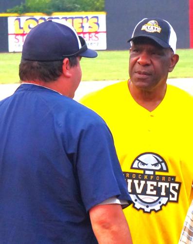 Chicago Cub outfielder and Baseball Hall of Famer Andre Dawson chats with a fan at the fundraising July 15 Legends Celebrity Softball Game at Rockford Rivets Stadium