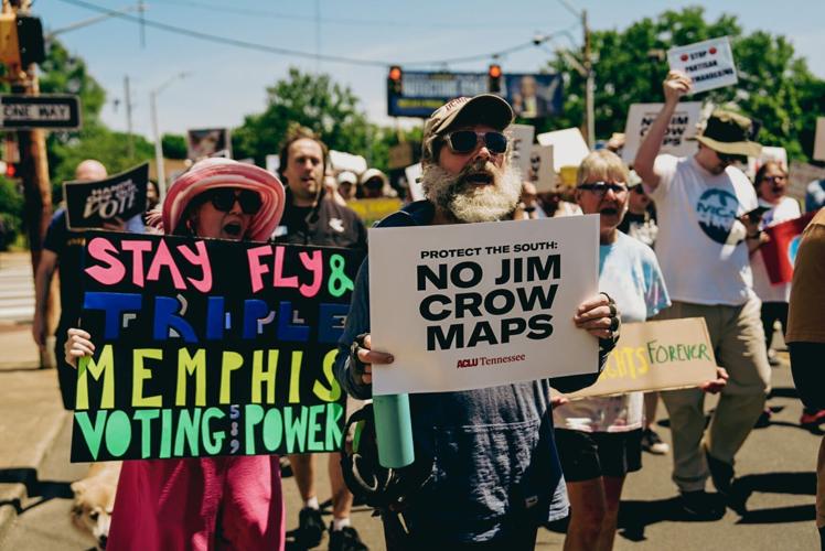 Demonstrators march during the “Memphis Won’t Be Silenced” march and rally from I AM A MAN Plaza to the National Civil Rights