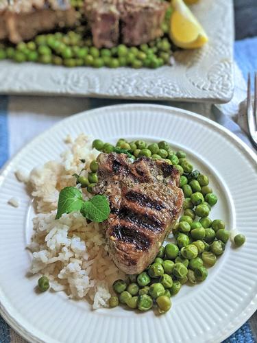 Lamb cooks quickly on the grill, and pairs well with a minty pea salad. ( Gretchen McKay/Pittsburgh Post-Gazette/ TNS.