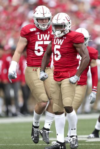 Under Armour tan pants against Northwestern, 2019