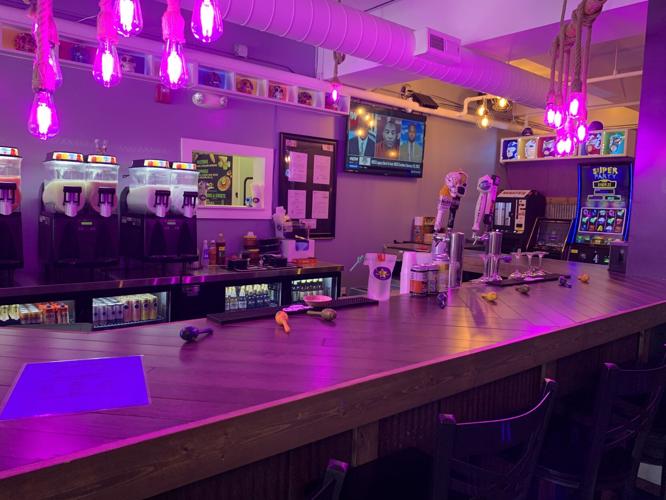 Guac Star features a colorful bar area