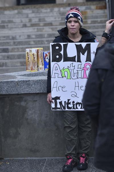 Emily Cahill protests at courthouse