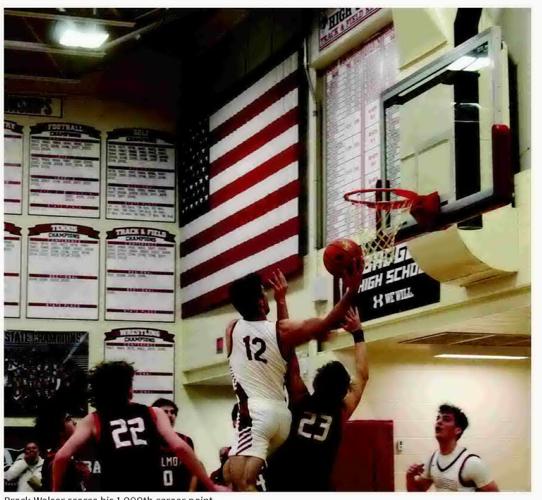 Badger double header ends in 2 wins and Walser's 1000th career point