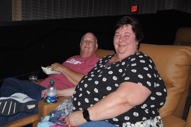 Mark and Cathy Hoppe of Delavan enjoy a snack before watching a movie in luxury
