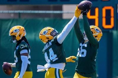 Green Bay Packers linebacker Zaire Franklin (44) tries to knock the ball away from linebacker Edgerrin Cooper (56) in a drill during practice on Tuesday, June 2, 2026, at Ray Nitschke Field in Ashwaubenon, Wis. 
Tork Mason/USA TODAY NETWORK-Wisconsin