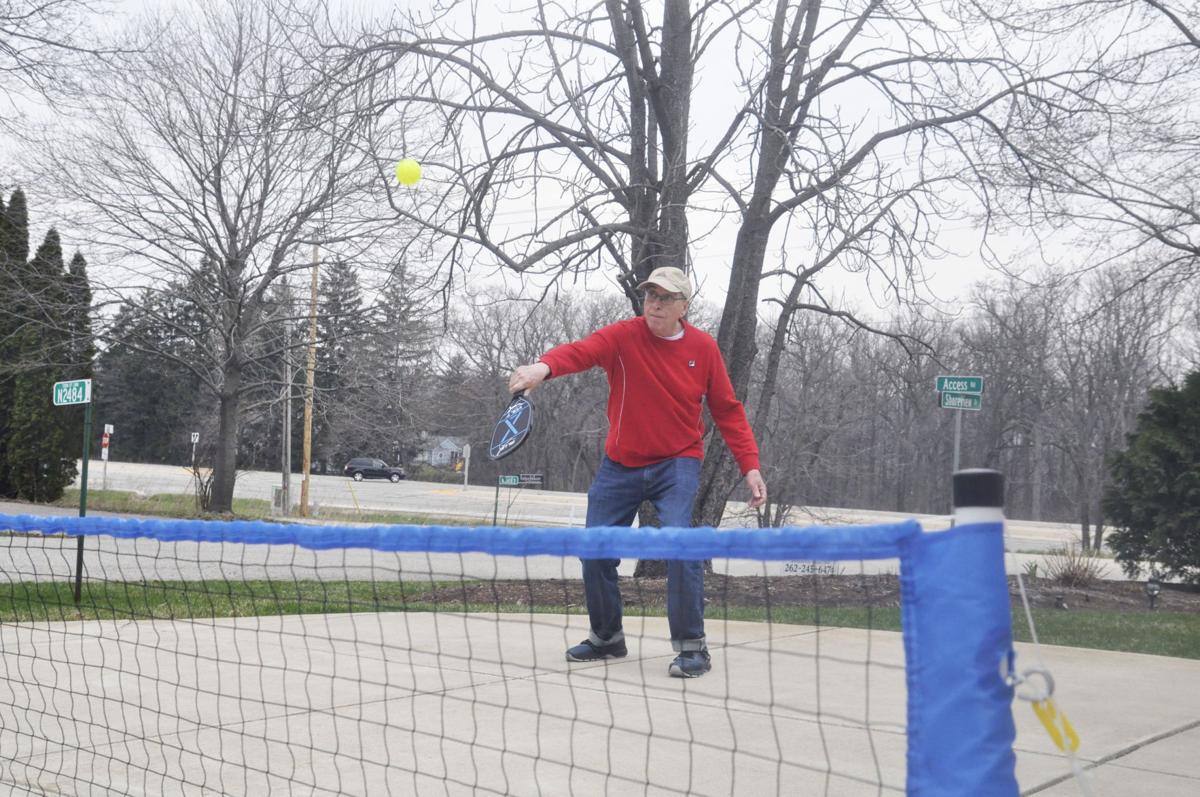 Warren Smith in driveway pickleball in the town of Linn