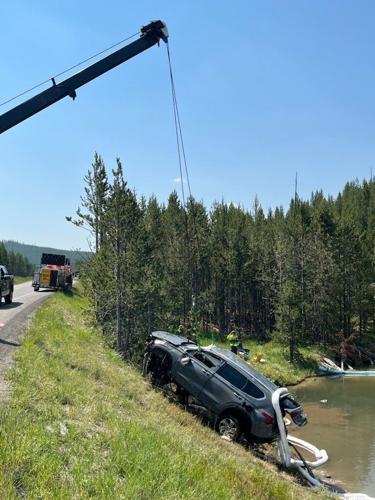 Crews remove car from geyser at Yellowstone National Park