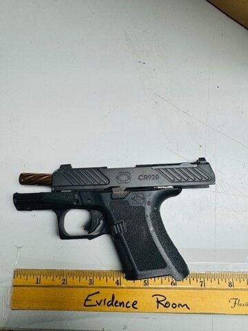 Handgun dropped in Monona Grove High School parking lot, police photo