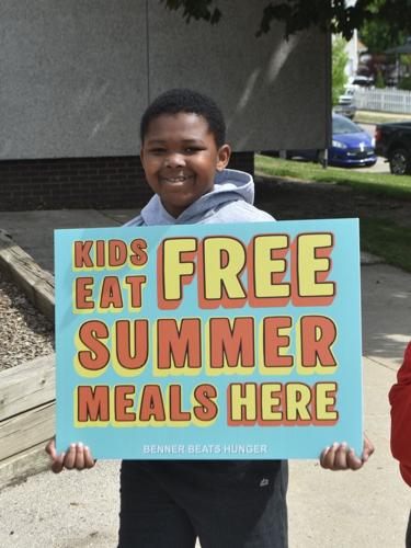 La’Marion Thompson smiles at summer meals kickoff event