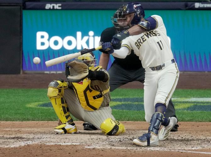 Milwaukee Brewers left fielder Jackson Chourio (11) hits a game-winning single during the ninth inning of their National League
