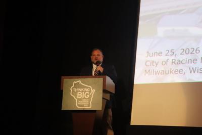 Racine Mayor Cory Mason speaks at Wisconsin passenger rail conference