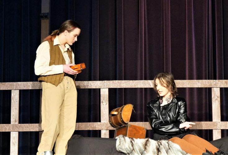 Dying Billy Bones entrusts treasure map to young Jim Hawkins