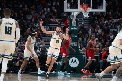 Milwaukee Bucks forward Pete Nance, center, reacts a basket during a game against the Chicago Bulls on Feb. 3 Fiserv Forum in Milwaukee.
