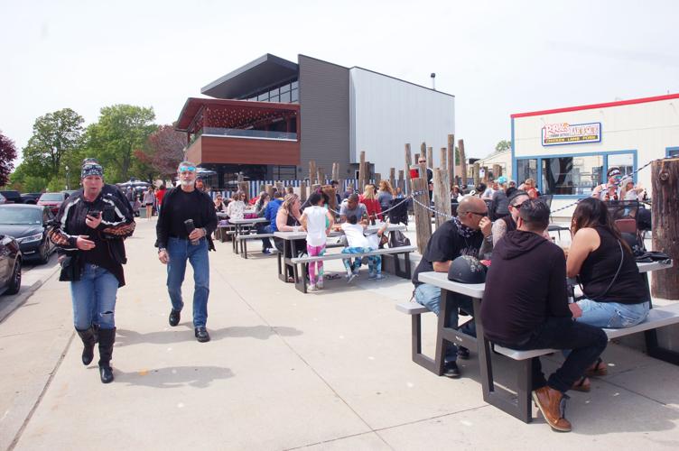 Popeye's outdoor patio fills up during first Saturday back