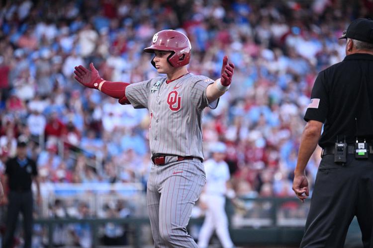 Jun 22, 2026; Omaha, NE, USA;  Oklahoma Sooners shortstop Jaxon Willits (7)  signals to the bench after driving in a run against the North Carolina Tar Heels during the fourth inning at Charles Schwab Field. Mandatory Credit: Steven Branscombe-Imagn Images