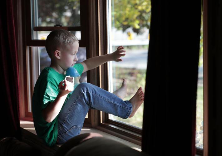 Colton by window
