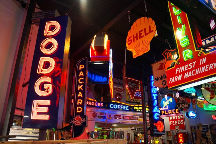 Auction items displayed for sale at Mecum Auctions' June 20-25 World's Largest Road Art Auction in Walworth