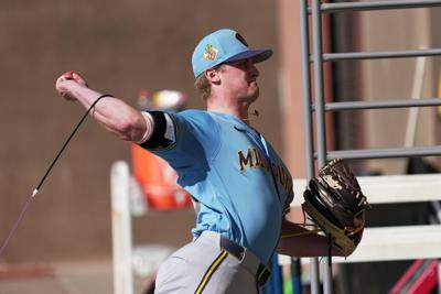 Quinn Priester throwing, AP photo