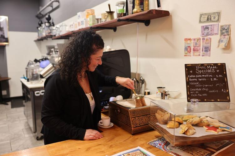 Melanie Buchaklian demonstrates how Armenian coffee is prepared