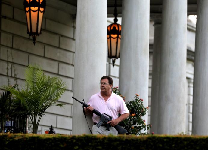 Protesters march to Mayor Lyda Krewson's house