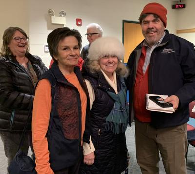 Robert Croce congratulates JaNelle Powers for being elected District 1 alderwoman during the April 1 spring election