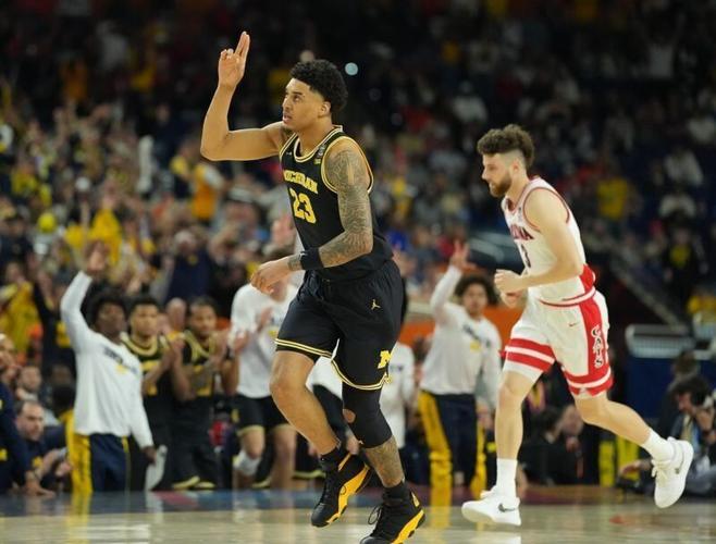 Apr 4, 2026; Indianapolis, IN, USA; Michigan Wolverines forward Yaxel Lendeborg (23) reacts against the Arizona Wildcats in the second half during a semifinal of the Final Four of the men's 2026 NCAA Tournament at Lucas Oil Stadium. Mandatory Credit: Ro...