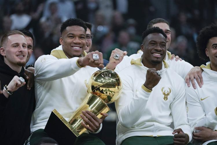 Giannis, Bucks show off championship rings at celebration, AP photo