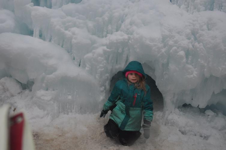 Ava Rasch, 7, of Genoa City finishes crawling through an ice castle tunnel