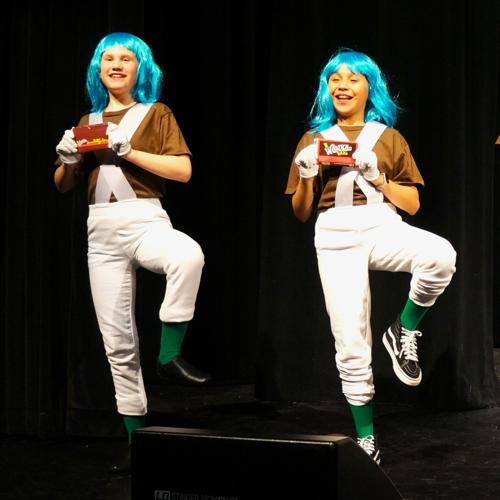 Oompa-Loompas sing and dance with Wonka Bars