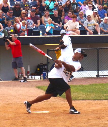 Retired Green Bay Packers wide receiver Charles Jordan swings for the fences at the July 15 Legends Celebrity Softball Game at Rockford Rivets Stadium