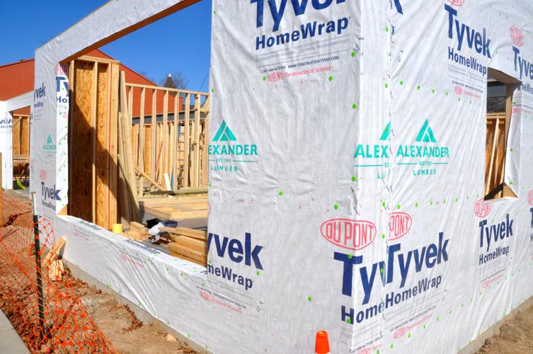 Walls of a two-story building that is being constructed at 323 Broad St. in downtown are in the process