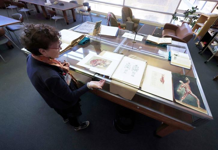 Micaela with exhibit case