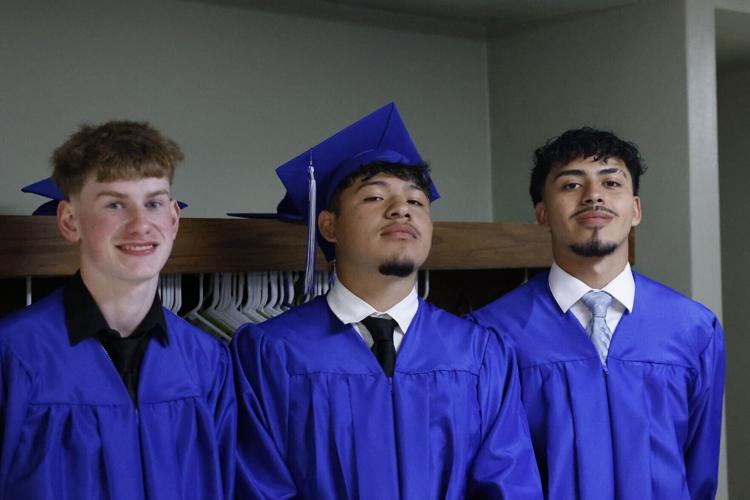 Three grads