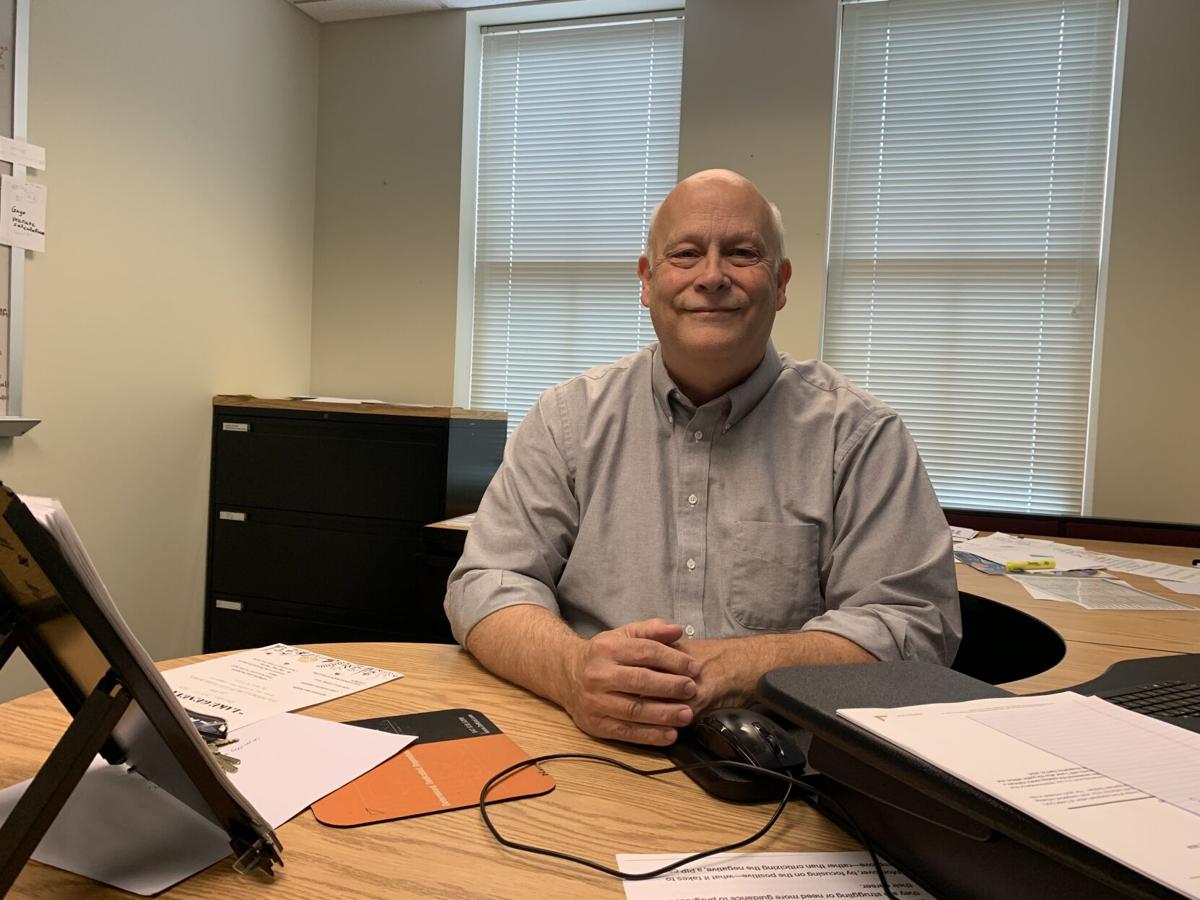 Outgoing Lake Geneva City Administrator Dave Nord sits at his former desk during one of his last days on the job