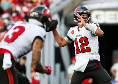 Tampa Bay Buccaneers quarterback Tom Brady drops back to pass against the Carolina Panthers during the first half action at Raymond James Stadium on Sunday, Jan. 9, 2022, in Tampa.
