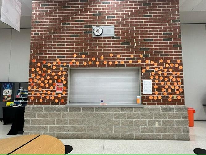 Girls Basketball cancer memorial wall