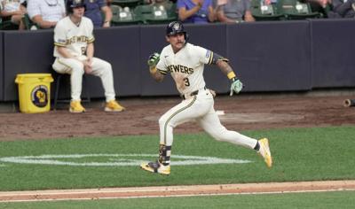 Milwaukee Brewers shortstop Joey Ortiz (3) hits a double during the sixth inning of their game against the New York Mets