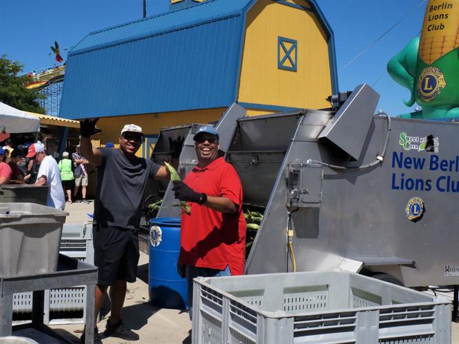 Volunteer corn-roasters at the Wisconsin State Fair