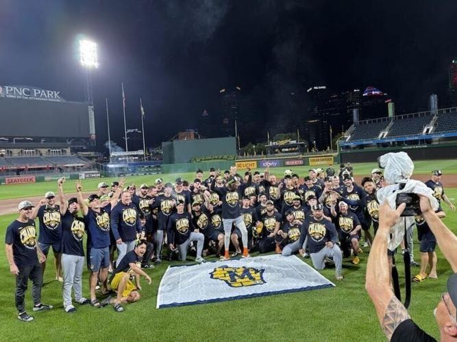 The Milwaukee Brewers take a team photo after clinching another National League Central Division title Sept. 15 at PNC Park.