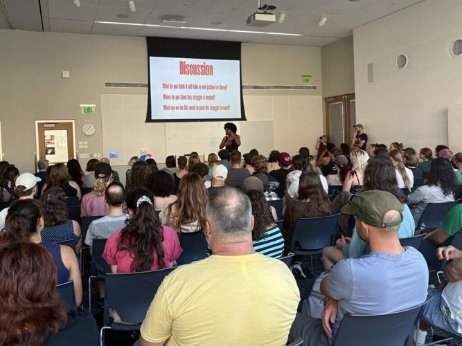 Demonstrators ask for clearer communication at organizing meeting