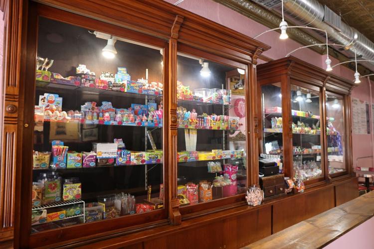 Candy displayed in old jewelry display cases