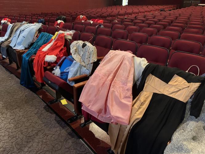 The cast members of "White Christmas the Musical" will be wearing a variety of costumes throughout their performance