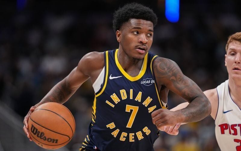 Indiana Pacers guard Kam Jones (7) rushes up the court Sunday, April 12, 2026, during the game at Gainbridge Fieldhouse in Indianapolis.