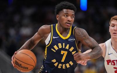 Indiana Pacers guard Kam Jones (7) rushes up the court Sunday, April 12, 2026, during the game at Gainbridge Fieldhouse in Indianapolis.
