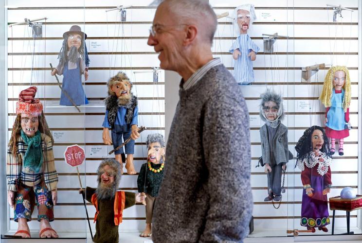 Ken Vogel with troll marionettes