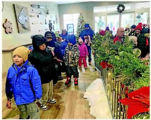 Central-Denison Elementary School students drop off letters to Santa