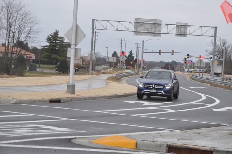 A car approaches the roundabouts on Highway 120. The roundabouts are apart of the highway's reconstruction project