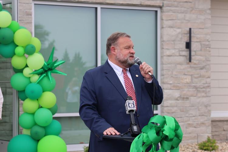 Mayor Cory Mason celebrates Pritchard Park Place ribbon cutting